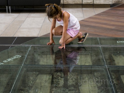 waterloo clearglassflooring girllookingthrough